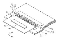 Display device having a pad in electrical contact with a circuit board