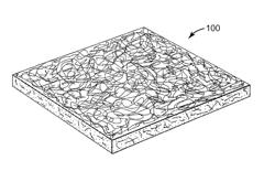 NONWOVEN ABRASIVE ARTICLE CONTAINING ELASTOMER BOUND AGGLOMERATES OF SHAPED ABRASIVE GRAIN