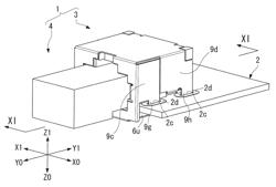 Electrical connector having shield with soldered terminal portions