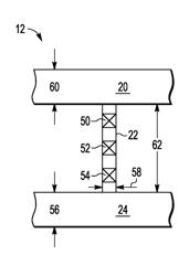 Semiconductor device with vias on a bridge connecting two buses