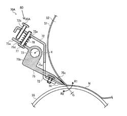 Media stripper, and fixing device and image forming apparatus employing same