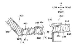 Image forming apparatus with waste toner container having a structure to avoid interference with a feed roller