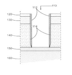 METHOD OF ETCHING A POROUS DIELECTRIC MATERIAL