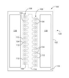 DISPENSING HEADS WITH FLUID PUDDLE LIMITING SURFACE FEATURES