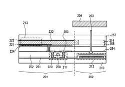 Display device with light receiving element under transparent spacer and manufacturing method therefor