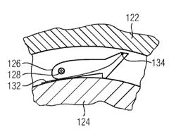 TURBOMACHINE FOR GENERATING POWER HAVING A TEMPERATURE MEASUREMENT DEVICE IN A REGION OF THE ROTOR