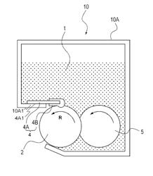 Regulating member, developing device and process cartridge