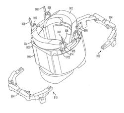 MOTOR HAVING A TWO-PIECE STATOR END RING