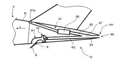 Signal strength dependent cover unlocking device for a duct housing a secondary power supply device in an aircraft fuselage