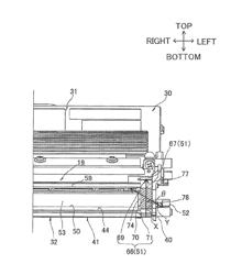 Developing device having seal members to restrict toner leakage