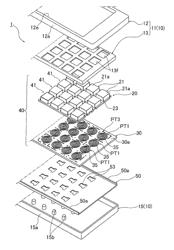 Controller provided with touch detection device including movable and fixed contact patterns