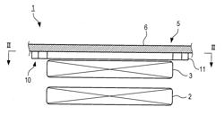 COIL MOUNTING STRUCTURE