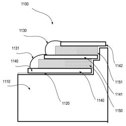 Apparatus for manufacturing stacked integrated component media inserts for ophthalmic devices