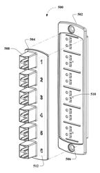 Fiber optic adapter plates with integrated fiber optic adapters