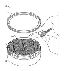 Fabric Having Tobacco Entangled with Structural Fibers