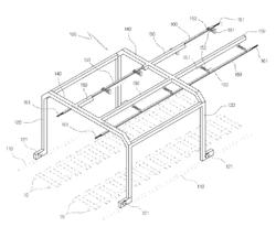 GANTRY TYPE MOVABLE CATENARY SYSTEM AT A RAILWAY CROSSING