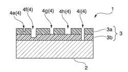 Surface-treated metal and method for producing same