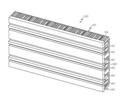 Cooling apparatuses and electronics modules having branching microchannels