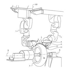 Process and apparatus for manufacturing a reinforcing structure of a tyre for vehicle wheels