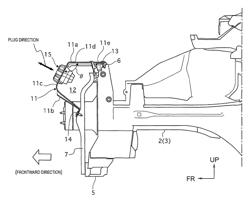 Impact energy absorbing vehicle charging port support arrangement