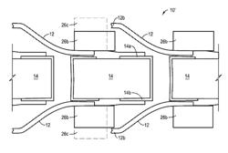 Electrical connector with electrical contacts protected by a layer of compressible material and method of making it