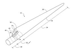 Wind turbine blade with plurality of longitudinally extending flow guiding device parts