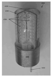 Bi-pin LED light bulb and related methods