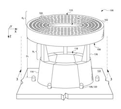 BURNER INCLUDING A PERFORATED FLAME HOLDER SPACED AWAY FROM A FUEL NOZZLE