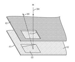 Shaped fuser reflector for externally heating a fuser assembly with variable size print media