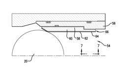 Selectively degradable passage restriction