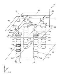 Magnetic memory device including magnetic portions nonmagnetic layers