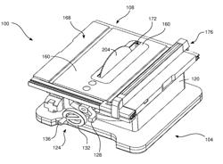 Table Saw Having a Dual Stage Power Train Assembly