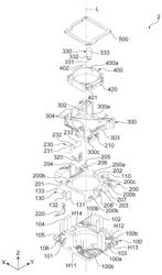 Lens driving device havng a movable element and a first column portion configured to limit a range of the movable element