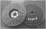 ABRASIVE ARTICLES INCLUDING SOFT SHAPED ABRASIVE PARTICLES