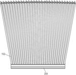 Strip brush assembly having metal and polymer bristles and method of making