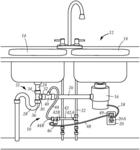 Garbage disposal waste line unclogging system