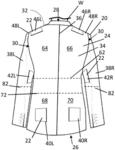 GARMENT WITH POCKET ACCESSIBLE FOR A PERSON ALONGSIDE A WEARER OF THE GARMENT