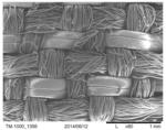 Fabrics containing conformable low density fluoropolymer fiber blends