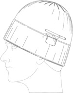 Hat with an opening and pocket for accommodating a cochlear implant