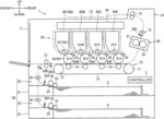 Image forming apparatus configured to stop conveyance of sheet for prescribed time period before conveying sheet to photosensitive drum when sheet is fed from first tray