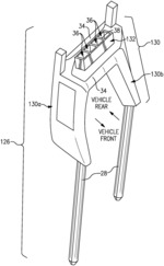 Vehicle head restraint with tuned damper