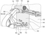 Method for mounting a roll of protective mesh material to an underground rock drilling machine, a method for attaching protective mesh material to a rock surface and a mounting device