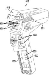 Devices and methods of managing energy dissipated within sterile barriers of surgical instrument housings