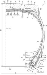 HEAVY DUTY TIRE AND PRODUCTION METHOD FOR HEAVY DUTY TIRE