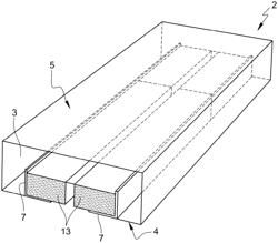 ACOUSTIC ATTENUATION DEVICE PROVIDED WITH INSERTS MADE OF ACOUSTICALLY ABSORBENT MATERIAL