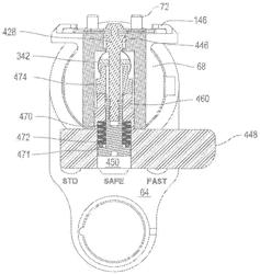 Surgical saw for actuating a saw blade with an oscillating head, the saw having a coupling assembly for releasably holding the saw blade