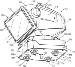 Light assembly for attachment to a surface of a vehicle